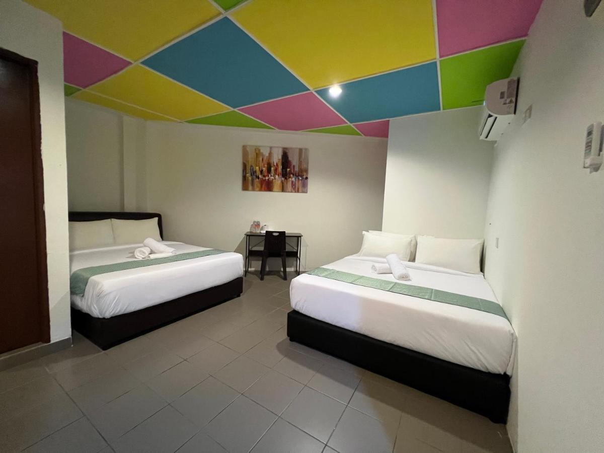 Cassia Inn Kuching Bagian luar foto